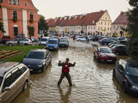 Residents are being evacuated by emergency workers after Nysa Klodzka river flooded town of Lewin Brzeski in southwestern Poland, on Septemb...