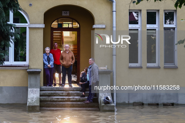 Residents are seen after Nysa Klodzka river flooded town of Lewin Brzeski in southwestern Poland, on September 17th, 2024. Storm Boris has c...