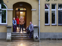 Residents are seen after Nysa Klodzka river flooded town of Lewin Brzeski in southwestern Poland, on September 17th, 2024. Storm Boris has c...