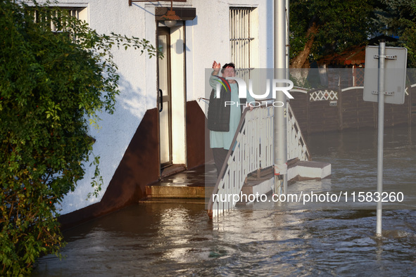 A resident is seen after Nysa Klodzka river flooded town of Lewin Brzeski in southwestern Poland, on September 17th, 2024. Storm Boris has c...