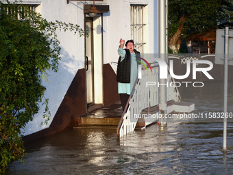 A resident is seen after Nysa Klodzka river flooded town of Lewin Brzeski in southwestern Poland, on September 17th, 2024. Storm Boris has c...