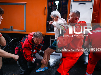 Residents are being evacuated by emergency workers after Nysa Klodzka river flooded town of Lewin Brzeski in southwestern Poland, on Septemb...