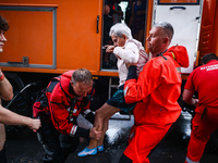 Residents are being evacuated by emergency workers after Nysa Klodzka river flooded town of Lewin Brzeski in southwestern Poland, on Septemb...