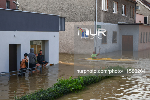 Residents are seen after Nysa Klodzka river flooded town of Lewin Brzeski in southwestern Poland, on September 17th, 2024. Storm Boris has c...