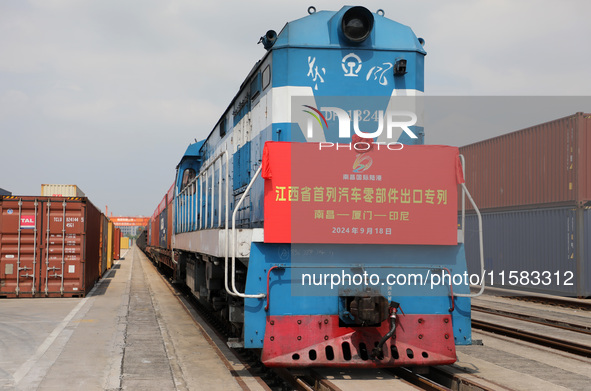 A special export container train loaded with auto parts leaves Nanchang International Dry Port in Nanchang, China, on September 18, 2024. 