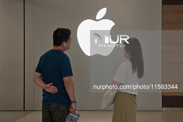 Customers are seen at an Apple Store near Nanjing Road Pedestrian Street in Shanghai, China, on September 18, 2024. 