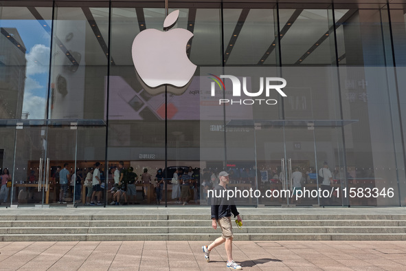 Customers are seen at an Apple Store near Nanjing Road Pedestrian Street in Shanghai, China, on September 18, 2024. 