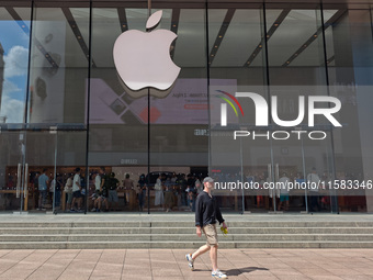 Customers are seen at an Apple Store near Nanjing Road Pedestrian Street in Shanghai, China, on September 18, 2024. (