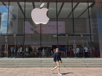 Customers are seen at an Apple Store near Nanjing Road Pedestrian Street in Shanghai, China, on September 18, 2024. (