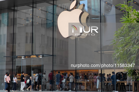 Customers are seen at an Apple Store near Nanjing Road Pedestrian Street in Shanghai, China, on September 18, 2024. 