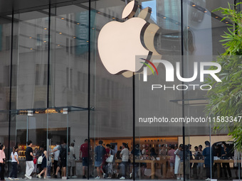 Customers are seen at an Apple Store near Nanjing Road Pedestrian Street in Shanghai, China, on September 18, 2024. (