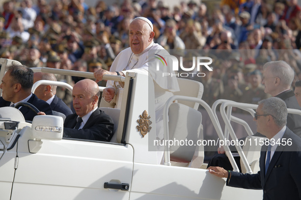 Pope Francis arrives for the weekly general audience in The Vatican, on September 18, 2024, at St Peter's Square. 