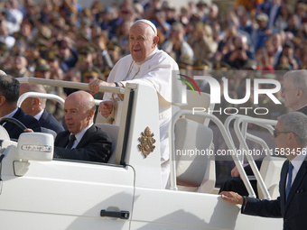 Pope Francis arrives for the weekly general audience in The Vatican, on September 18, 2024, at St Peter's Square. (