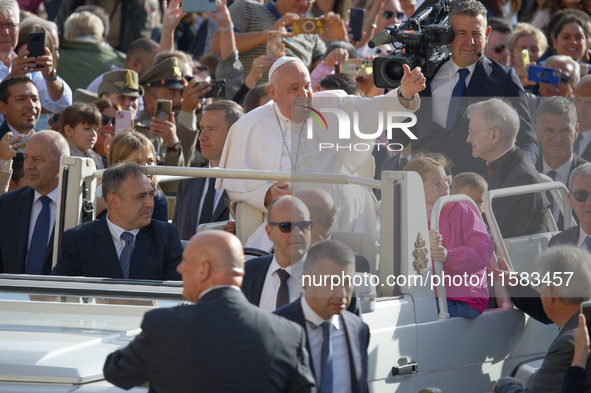 Pope Francis arrives for the weekly general audience in The Vatican, on September 18, 2024, at St Peter's Square. 