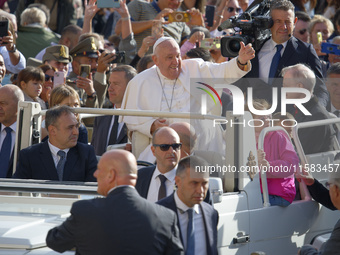 Pope Francis arrives for the weekly general audience in The Vatican, on September 18, 2024, at St Peter's Square. (