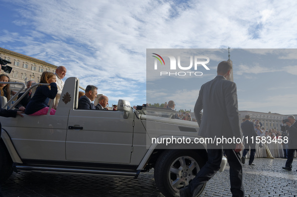 Pope Francis arrives for the weekly general audience in The Vatican, on September 18, 2024, at St Peter's Square. 