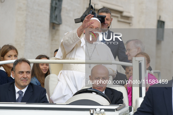 Pope Francis arrives for the weekly general audience in The Vatican, on September 18, 2024, at St Peter's Square. 