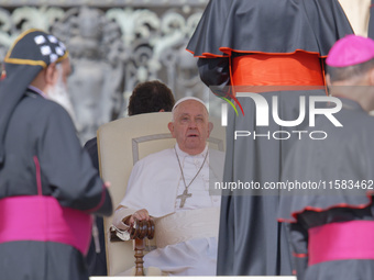 Pope Francis greets bishops and cardinals at the end of his Wednesday general audience in Saint Peter's Square (