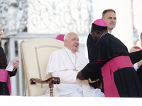 Pope Francis greets bishops and cardinals at the end of his Wednesday general audience in Saint Peter's Square (