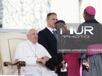 Pope Francis greets bishops and cardinals at the end of his Wednesday general audience in Saint Peter's Square (