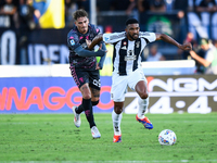 Sebastiano Esposito of Empoli fights for the ball with Gleison Bremer of Juventus during the Serie A match between Empoli and Juventus at St...