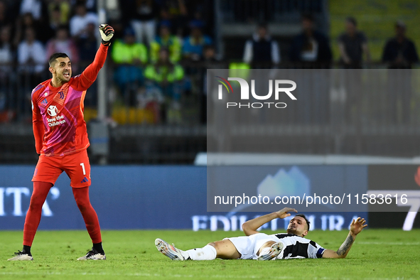 Mattia Perin of Juventus calls the referee after Federico Gatti is hit by a headbutt during the Serie A match between Empoli and Juventus at...