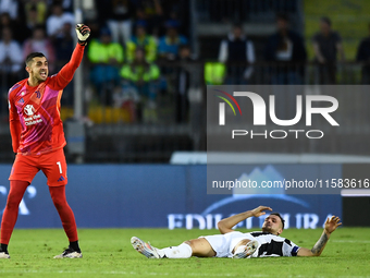 Mattia Perin of Juventus calls the referee after Federico Gatti is hit by a headbutt during the Serie A match between Empoli and Juventus at...