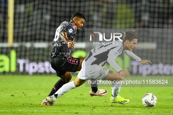 Nicolo Fagioli of Juventus fights for the ball with Tino Anjorin of Empoli during the Serie A match between Empoli and Juventus at Stadio Ca...