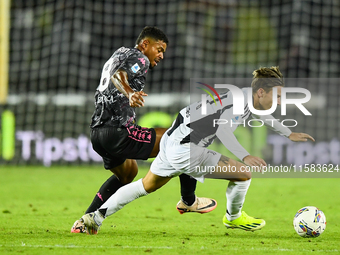 Nicolo Fagioli of Juventus fights for the ball with Tino Anjorin of Empoli during the Serie A match between Empoli and Juventus at Stadio Ca...