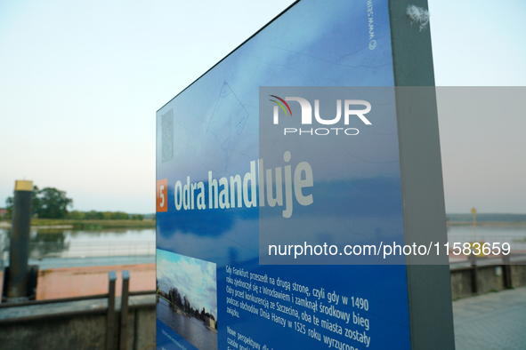 A sign reading 'Odra trades' in Polish is seen in Frankfurt (Oder) on 17 September, 2024. After warnings of increasing water levels on sever...