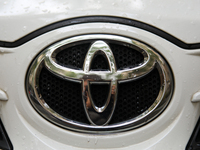 The Toyota logo in the rain is seen on the street in Krakow, Poland, on August 21, 2024. (