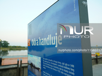 A sign reading 'Odra trades' in Polish is seen in Frankfurt (Oder) on 17 September, 2024. After warnings of increasing water levels on sever...