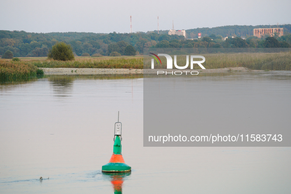 A buoy is seen floating in the Oder river in Frankfurt (Oder) on 17 September, 2024. After warnings of increasing water levels on several ri...