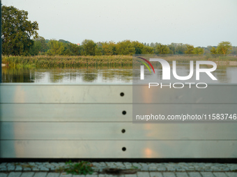 A newly installed flood barrier is seen alond the Oder river with the Polish border seen on the far side in Frankfurt (Oder) on 17 Septembe,...