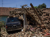 The ruins of a house after a 5.0 magnitude earthquake strike in Kertasari, West Java, on September 18, 2024. At least 700 houses are damaged...