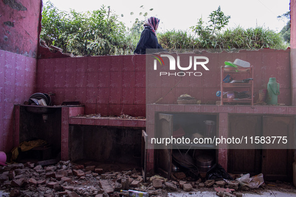 The ruins of a house after a 5.0 magnitude earthquake strike in Kertasari, West Java, on September 18, 2024. At least 700 houses are damaged...