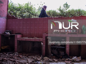 The ruins of a house after a 5.0 magnitude earthquake strike in Kertasari, West Java, on September 18, 2024. At least 700 houses are damaged...