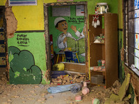 The wall of a kindergarten school collapses after a magnitude 5.0 earthquake strikes in West Java, Indonesia, on September 18, 2024. At leas...