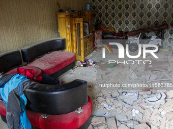 The ruins of a house collapse after a 5.0 magnitude earthquake strikes in Kertasari, West Java, on September 18, 2024. At least 700 houses a...