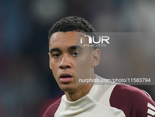 Jamal Musiala of Bayern Munich  looks on  during the Champions League Round 1 match between Bayern Munich v Dinamo Zagreb, at the Allianz Ar...