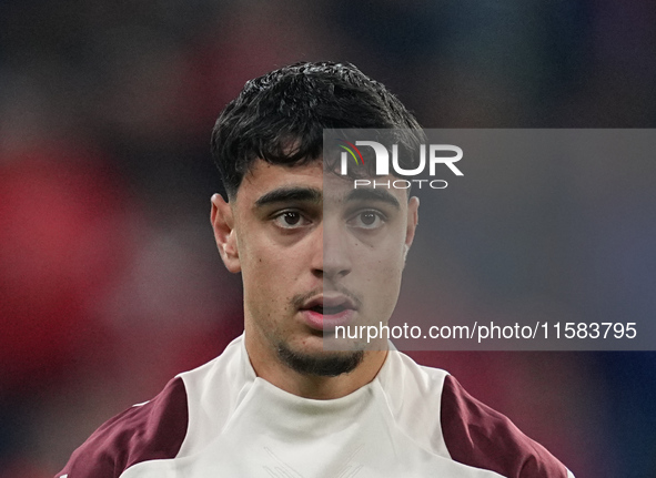 Aleksandar Pavlovic of Bayern Munich  looks on  during the Champions League Round 1 match between Bayern Munich v Dinamo Zagreb, at the Alli...