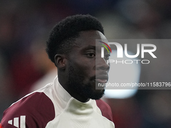 Alphonso Davies of Bayern Munich  looks on  during the Champions League Round 1 match between Bayern Munich v Dinamo Zagreb, at the Allianz...