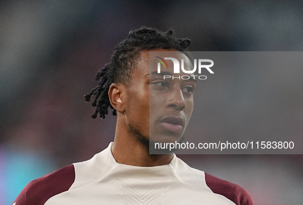 Michael Olise of Bayern Munich  looks on  during the Champions League Round 1 match between Bayern Munich v Dinamo Zagreb, at the Allianz Ar...