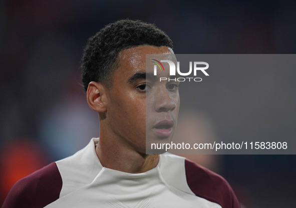 Jamal Musiala of Bayern Munich  looks on  during the Champions League Round 1 match between Bayern Munich v Dinamo Zagreb, at the Allianz Ar...