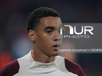 Jamal Musiala of Bayern Munich  looks on  during the Champions League Round 1 match between Bayern Munich v Dinamo Zagreb, at the Allianz Ar...