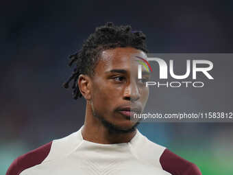 Michael Olise of Bayern Munich  looks on  during the Champions League Round 1 match between Bayern Munich v Dinamo Zagreb, at the Allianz Ar...