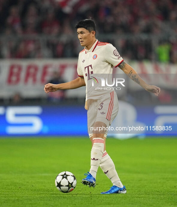 Minjae Kim of Bayern Munich  controls the ball  during the Champions League Round 1 match between Bayern Munich v Dinamo Zagreb, at the Alli...