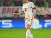 Minjae Kim of Bayern Munich  controls the ball  during the Champions League Round 1 match between Bayern Munich v Dinamo Zagreb, at the Alli...