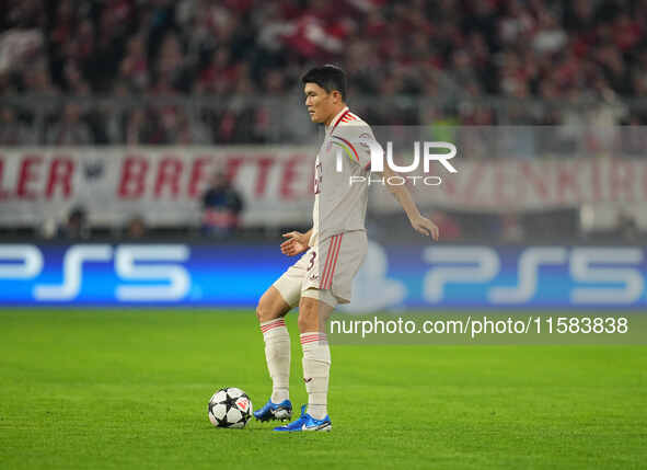 Minjae Kim of Bayern Munich  controls the ball  during the Champions League Round 1 match between Bayern Munich v Dinamo Zagreb, at the Alli...