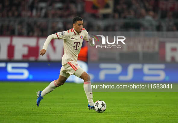 Jamal Musiala of Bayern Munich  controls the ball  during the Champions League Round 1 match between Bayern Munich v Dinamo Zagreb, at the A...